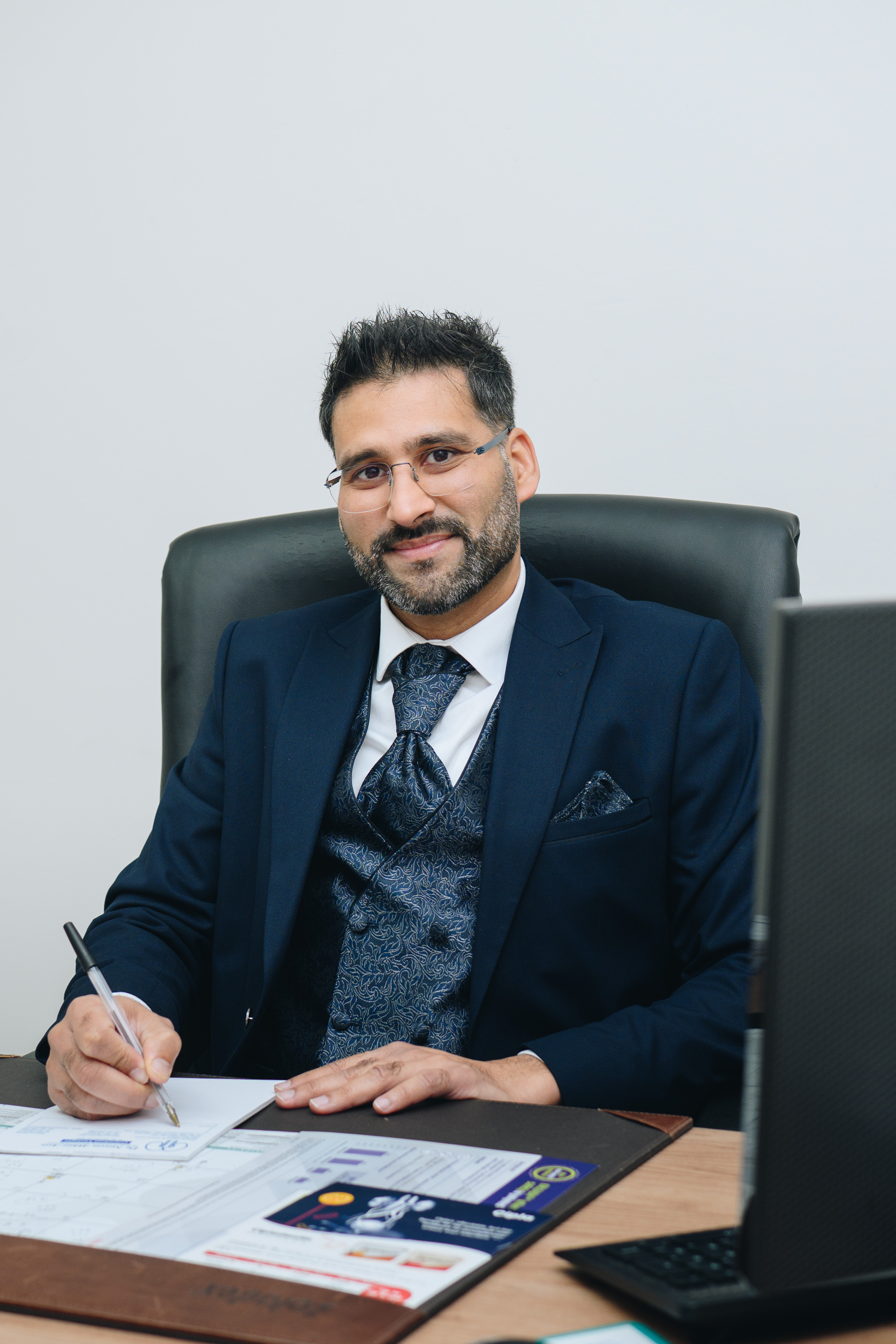 Dr Mohammad Nathire in consultation